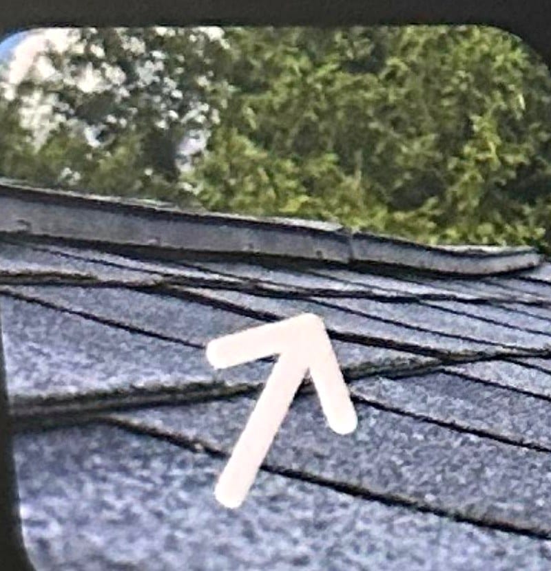 Gap forming along a roof ridge vent
