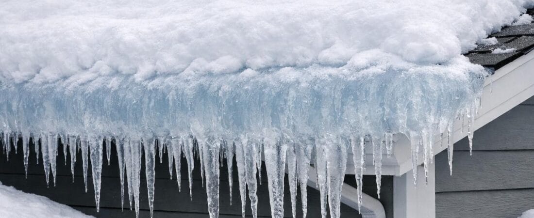 Winter ice dam roof Capital Roofing and Exteriors Ice dam on a roof in winter